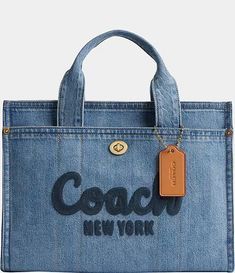 COACH Denim Cargo Tote Bag | Dillard's Coach Denim, Denim Cargo, Coach New York, Denim Tote Bags, Denim Tote, Women Cargos, Medium Tote, Denim Bag, Coach Bag