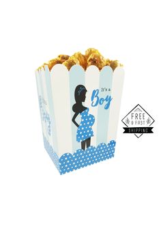 a blue and white popcorn box with the words it's a boy on it