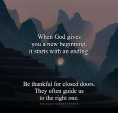 a person standing on top of a mountain with a light in their hand and the words, when god gives you a new beginning, it starts with an ending