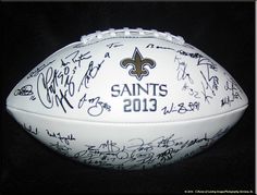 an autographed new orleans saints football