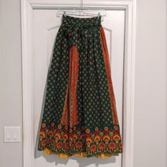 This Skirt Is Stunning! A True Vintage Gem From The 1970s! So Many Vibrant Colors And Patterns. Marked Vintage Size 11. Wraparound Waist (Flat Lay 14" Maximum) Or Smaller As You Can Cinch It In. I Wouldn't Recommend Larger Than A 28" Waist As There Will Be A Vertical Gap Down The Skirt Where Your Legs Will Show. Always Open To Reasonable Offers Boho Maxi Skirt, Maxi Skirt Boho, Ellen Tracy, Boho Maxi, 70s Vintage, Colors And Patterns, Green Orange, True Vintage, The 1970s