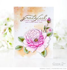 a handmade card with pink flowers and green leaves on the front, reads grateful