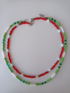 three strand necklace with red, green and white beads