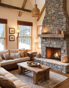 a living room filled with furniture and a fire place