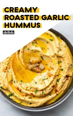 creamy roasted garlic hummus in a bowl