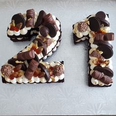 the number twenty five is made up of chocolate and marshmallows with candies