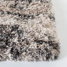 an area rug with many different colors and sizes