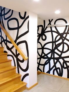 the stairs are painted with black and white designs