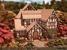 an image of a doll house in the middle of trees and bushes with fall foliage