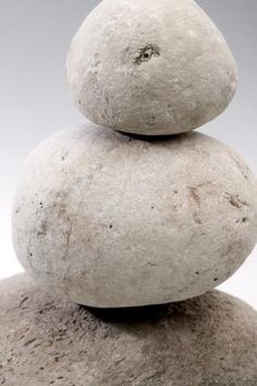 three white rocks stacked on top of each other