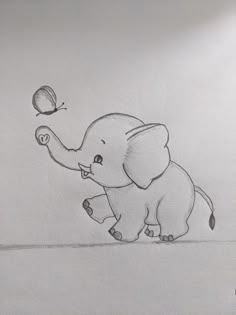 a drawing of an elephant playing with a ball