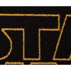 a black and gold logo with the word st louis on it's left side