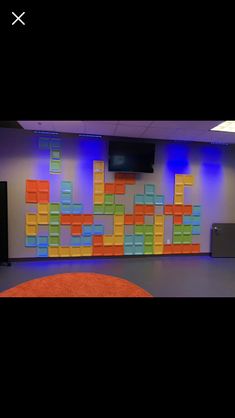 the room is decorated with colorful blocks and lights