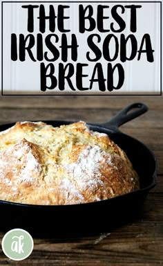 a loaf of irish soda bread in a cast iron skillet on a wooden table