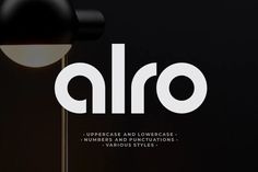 the word alro appears to be written in white on a black background with a lamp