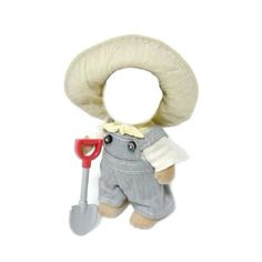 a stuffed animal with a hat, overalls and a shovel