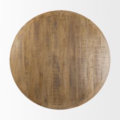 a round wooden table top on a white background