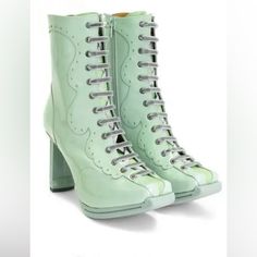 Gorgeous Pistachio (Mint) Green Patent Leather Lace Up Boots With Architectural Heel And Toe Details. Painted 3.75" Rubber Heel With About 1/2" Platform. These Are Fabulous. I Spent About An Hour In The Store, Walking Around In Them Before Buying Them, I Could Not Believe That Heels This High Could Be This Comfortable. I'm Saying Farewell To Them Because I Need To Recover Some Cash! My $100 Loss Is Your Happy Gain. These Run About A Full Size Small I Am A 9 To 9 1/2 Wide (9.5w In Most Brands.) T Light Green Boots, Cottagecore Shoes, Lyra Heartstrings, Dream Shoe, Green High Heels, Lace Up Heel Boots, Patent Boots, John Fluevog, Green Boots