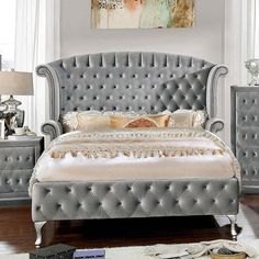 Alzir Button Tufted Bed in Gray. Admire the glamorous wingback headboard as glimmering acrylic button tufts and framing nailhead trim dazzles. Cabriolet feet add a finishing polish as they provide unwavering support to this elegant bed. Button Tufted Bed, Grey Bedroom Set, Upholstered Sleigh Bed, Eastern King Bed, Wingback Bed, Tufted Bed, Elegant Bedding, Wingback Headboard, King Bedroom Sets