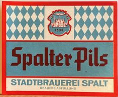 the label for spalter pils is shown in red, white and blue