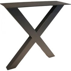 a black table with two crossed legs on the bottom and one leg raised up to the side