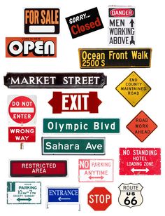 many different street signs are grouped together