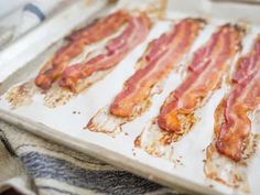 bacon on a baking sheet ready to be cooked in the oven for dinner or dessert