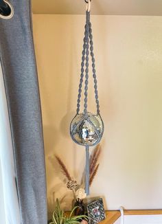 🪴100% Cotton 4mm Cord Hand Made Macrame Plant Hanger🪴 🌱Sizing🌱 Approximitly 40 inches in Length from the top of the ring to the bottom of the fringe 🧶 Fits Smaller pots. If you have any questions  or concerns please message me. ✨Please note that only the Macrame hanger itself is included. No plants, disco balls, pots, or wooden trays are included✨ 🖤Each order that I receive is made at the time that I receive it. Each order is custom made for you; due to the nature of handmade products the Wooden Trays, Macrame Hanger, Macrame Plant Hangers, Disco Balls, Macrame Ideas, The Fringe, Macrame Design, Plant Holder, Wooden Tray