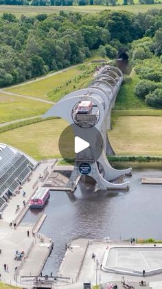 an aerial view of a bridge over a body of water