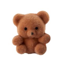 a brown teddy bear sitting up against a white background