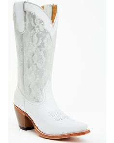 Snip toe. White leather vamp. Silver leather shaft with floral pattern design. Pull tabs. Leather outsole with rubber heel cap. Western heel. Winter Wedding Shoes The Bride Boots, Bridal Boots Cowboy, White Wedding Cowgirl Boots, Wedding Cowgirl Boots For Bride, White Boots Wedding, Wedding Cowboy Boots For Bride, Wedding Boots For Bride, Wedding Cowgirl Boots, White Cowboy Boots Wedding