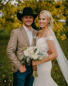 a bride and groom posing for a photo