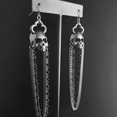 "Handcrafted & hand poured lead-free pewter skull with cathedral cross & black spinel rosary. Chandelier Skull is 1¼ L x ⅝\" W Overall length is 4.5\" Stud skull is ½\"W x ¾L They are hollowed as much as possible making them a comfortable weight." Gothic Metal Skull Jewelry, Gothic Skull Shaped Metal Jewelry, Gothic Skull Metal Jewelry, Gothic Silver Jewelry With Skull Print, Gothic Skull Jewelry With Skull Print, Silver Skull Print Jewelry For Halloween, Halloween Silver Jewelry With Skull Print, Edgy Nickel-free Skull Jewelry, Halloween Metal Jewelry With Oxidized Finish