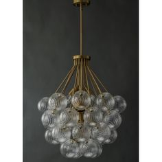 a chandelier with glass balls hanging from it