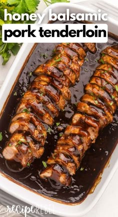 honey balsamic pork tenderion in a white casserole dish