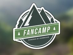 a sticker with the word fancamp on it and mountains in the background