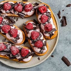 chocolate and raspberry crosts on toasted bread with white icing