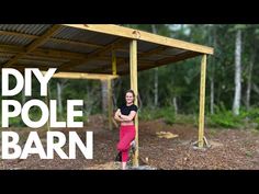 a woman standing in front of a wooden structure with the words diy pole barn