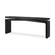 a black wooden bench sitting on top of a white floor