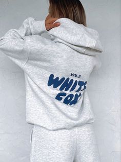 Cozy Crew Neck Hoodie For Streetwear, Cozy Graphic Print Hoodie For Streetwear, Cozy White Hoodie For Streetwear, Cozy Hoodie With Letter Print For Streetwear, White Hooded Letter Print Sweats, White Hooded Sweats With Letter Print, Gray Graphic Print Hoodie For Loungewear, Cozy White Sweats For Streetwear, Black Mini Ugg