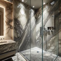 a bathroom with marbled walls and flooring, including a walk - in shower