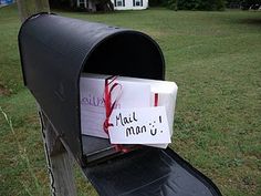 a mailbox with a note attached to it