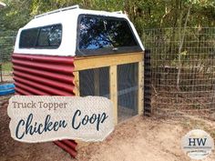 a truck topper chicken coop in the dirt