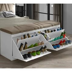 the shoe rack is made from wood and has multiple compartments for shoes