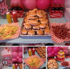 a table filled with lots of food and balloons