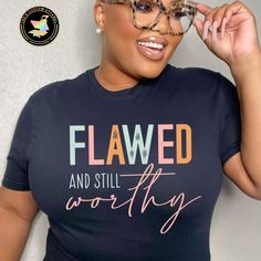 This 'Flawed and Still Worthy' t-shirt is a reminder that no matter what life throws at you, you are still capable of greatness. Show off your appreciation for yourself and others with this stylish and meaningful shirt. - FREE Shipping When You Spend $35! - Unisex T-shirt is 100% pre-shrunk cotton. - Shirt Available in Various Colors.  SIZING: - In order to get an accurate size, we recommend finding a similar item you already have, lay it flat, and measure it in inches. - Make sure to match those measurements to the Size Chart.  Care and Handling: - To ensure the longevity of your product we recommend washing this tee in cold water and drying on low heat or hang to dry.  - Do not bleach.  - Do not dry clean. - Do Not iron print. Important: - All items are MADE TO ORDER and have a fulfillme Trendy Tshirts Graphic Tees Design, Flawed And Still Worthy, Trendy T Shirt Designs, Christian Shirts Designs, Imperfectly Perfect, I Am Enough, Cute Shirt Designs, I Am Worthy, Christian Tees