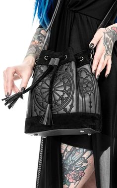 Carry a piece of stained glass art wherever you go with this stunning bag from Restyle. Luxury Bucket Bag With Metal Details, Cheap Punk Halloween Bags, Luxury Travel Bucket Bag With Leather Lining, Cheap Alternative Black Bags, Cheap Gothic Bags For Halloween, Affordable Gothic Halloween Bags, Window Embroidery