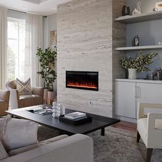 a living room filled with furniture and a fire place in the middle of the room