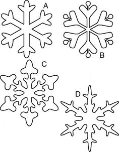 four snowflakes that have been cut out to look like they are in different shapes