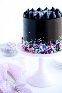 there is a chocolate cake with sprinkles on it